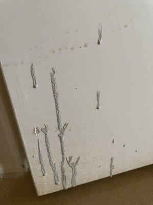 Here they splashed cement on the door to the bedroom and just left it there to dry!