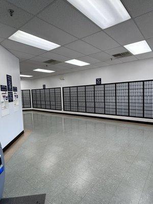 The entrance at the USPS - Battleground Office with a view of the customer postal boxes for rent.