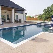 Custom gunite pool with spa.