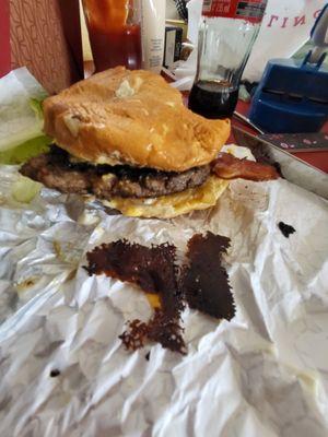 The Burger was overcooked and yes that's the black cheese.