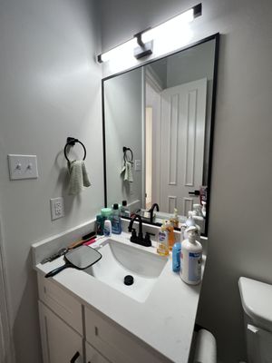 1/4" Clear Annealed Bathroom Mirror With Black Metal Frame