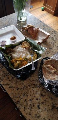 Curry veg, coconut roti and chili paste, fish roti and onion bun.