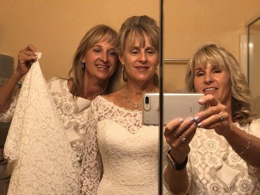 Selfie shot in the mirror of the bride and sisters... we loved our hair and make up.