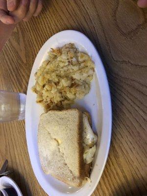 Egg Sandwich and hash browns