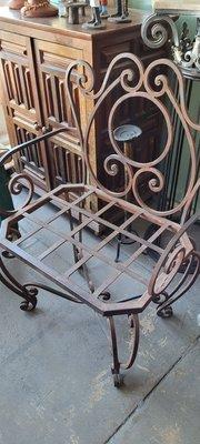 Isn't this gorgeous? Easily seats two! Handmade wrought-iron chair.