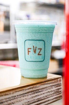 Aqua Marine Frozen Lemonade: lemonade & ice cream freeze w/ blue curacao, passion fruit, & pineapple syrups