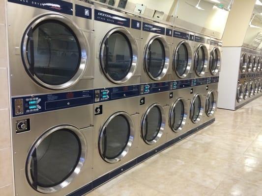 Brand new dryer machines lining both side of the wall!