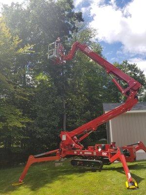 Our new lift being put to work! We can reach all new heights now!