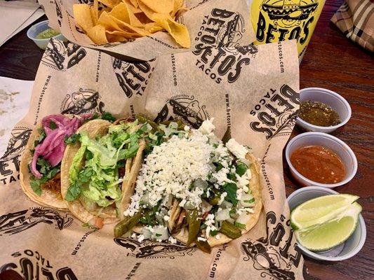 Four delicious tacos: pibil, grilled shrimp, cactus, and poblano