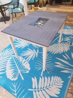 Custom built dining table with glass insert for shells and starfish. Many colors and sizes available!