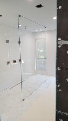 Custom 1/2 low iron clear glass shower screen.