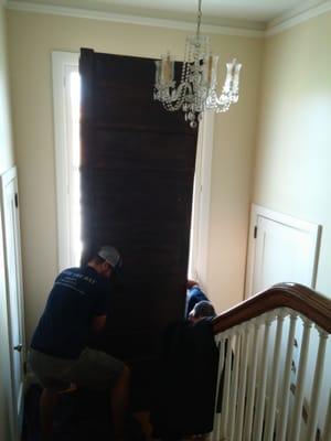 Moving a 9ft buffet upstairs with percision at historic Joseph Pendleton's house in Coronado!!