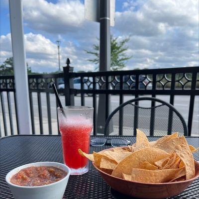 Blended Strawberry Margarita with chips and  fresh salsa