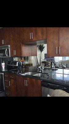 Mirror kitchen splashback installation