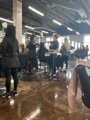 Students cutting and styling hair