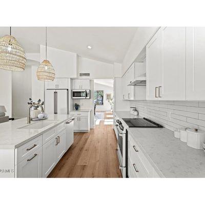 Kitchen Cabinets, Countertops, & Flooring