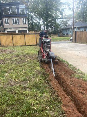 Underground trenching for electrical gate