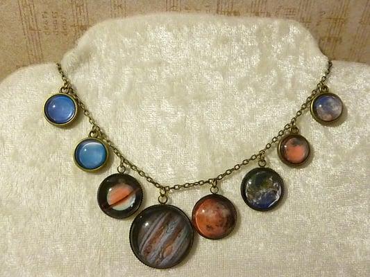 Solar system necklace with Pluto.  Also available in cuff links, earrings, or bracelet. We can create jewelry with YOUR photo.