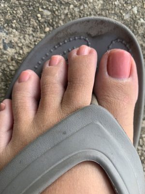 Different colored toes and polish on my big toe.