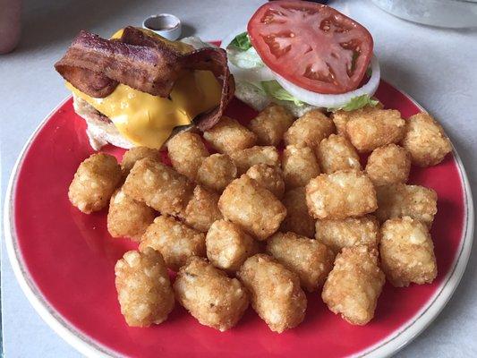 The bacon cheeseburger -- $7.95. They let me substitute fries for tots.