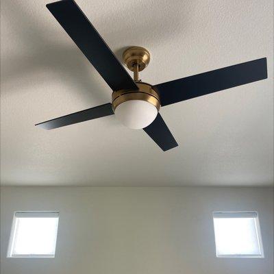 Bedroom ceiling fan installation.