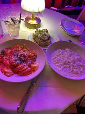 Ravioli, garlic bread, and burrata risotto