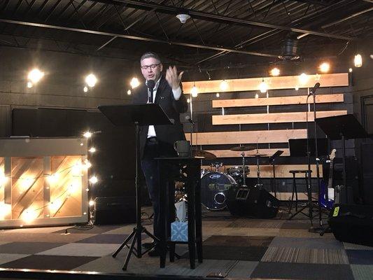 Pastor Brian speaking at Passion