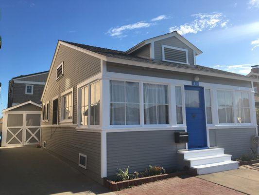 Beach bungalow showing off its character again after a facelift in Newport Beach.