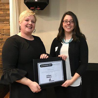 Amy and Kristen accept the Chamber's beautification award for the Sidney Alive office renovation.