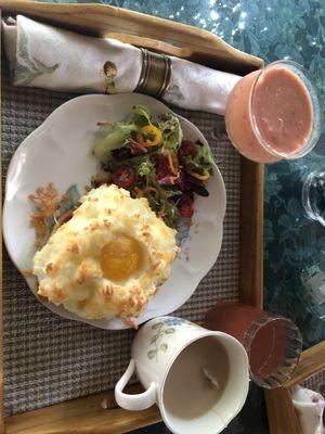 Homemade Eggs in a Cloud with a salad, fresh smoothie for Breakfast