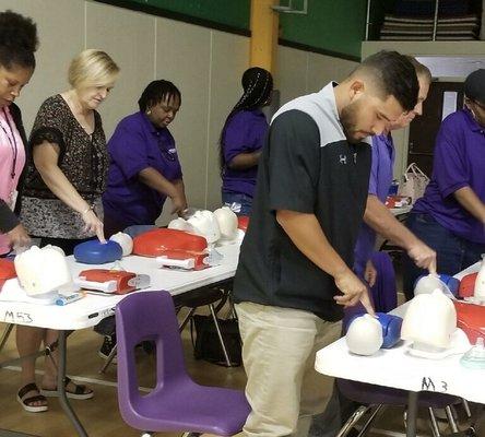 School teachers learning how to save a life