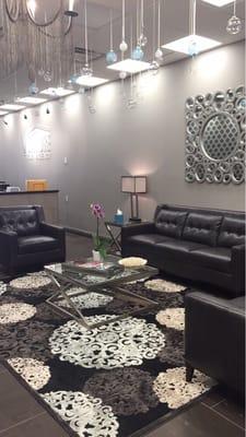 Comfy lounging area before you begin your closing. Candy table, deserts, and pastries just for our clients.