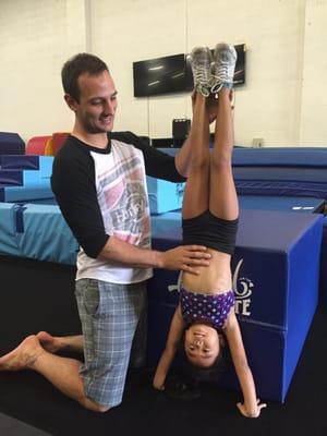 Coach Levi @ Island Elite working on tumbling technique with athletes!