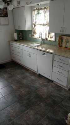 Kitchen Remodel
  -Tile Flooring, Backsplash, and Cabinet Install