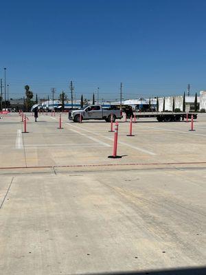 This vehicle and trailer requires a Class A license because the trailer has GVWR over 10,000 lbs. May very from state to state