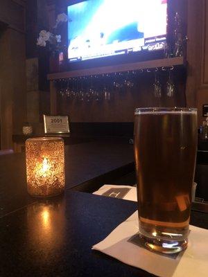 Dim lights, craft beer, sports on TV