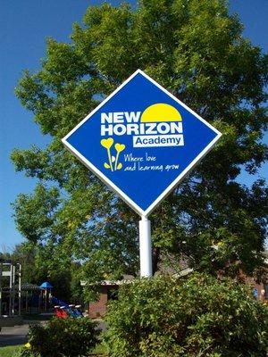 New Horizon pole sign w/ digitally printed flex face.