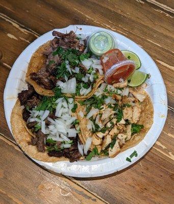 Asada (left), Barbacoa (top), Chicken (right). Provided were two limes and salsas.