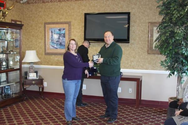 Patty Steury is recognized for outstanding customer service and contribution in 2014. Pictured (left to right) Steve Nichols,...