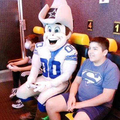 So much fun that Rowdy the Dallas Cowboys mascot stop by to have fun and play games in our game truck.