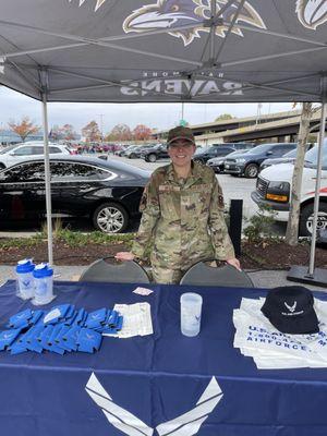 Air Force recruiter at table set up inside Baltimore Ravens Stadium