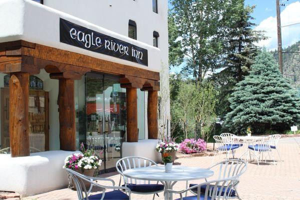 A refreshed Eagle River Inn entry July 2024 open for booking rooms with continental breakfast and free parking.