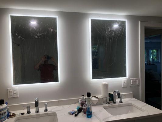 Lighted mirrors