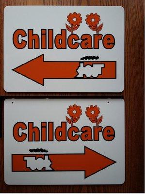 Hallway signs for a church.