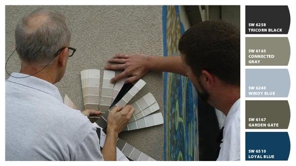 Owner Mark Wortham and crew leader Jacob Thompson selecting just the right colors for a graffiti cover!