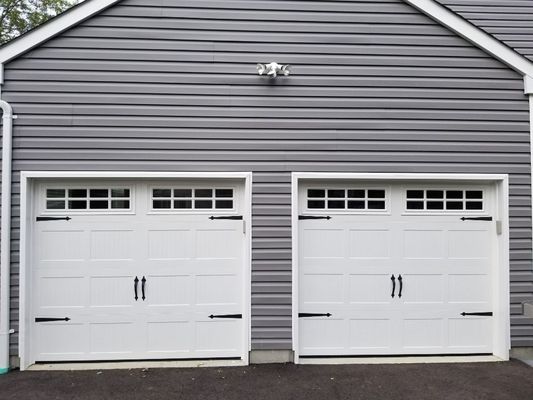 Above & Beyond Garage Doors is licensed & insured business.This carriage house style garage door was installed in Stonybrook. Free Estimates