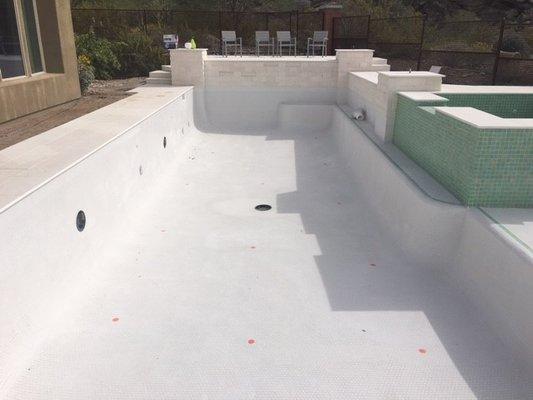 classic designed pool all tile in white