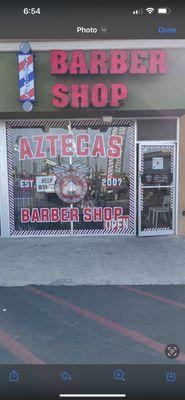 This is the outside of the barber shop