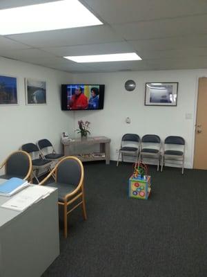 Waiting Room equipped with TV and Small Child Play Area