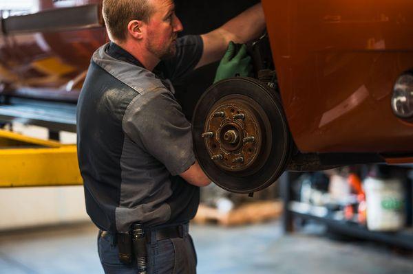 One of our Certified Technicians working on a customers vehicle.